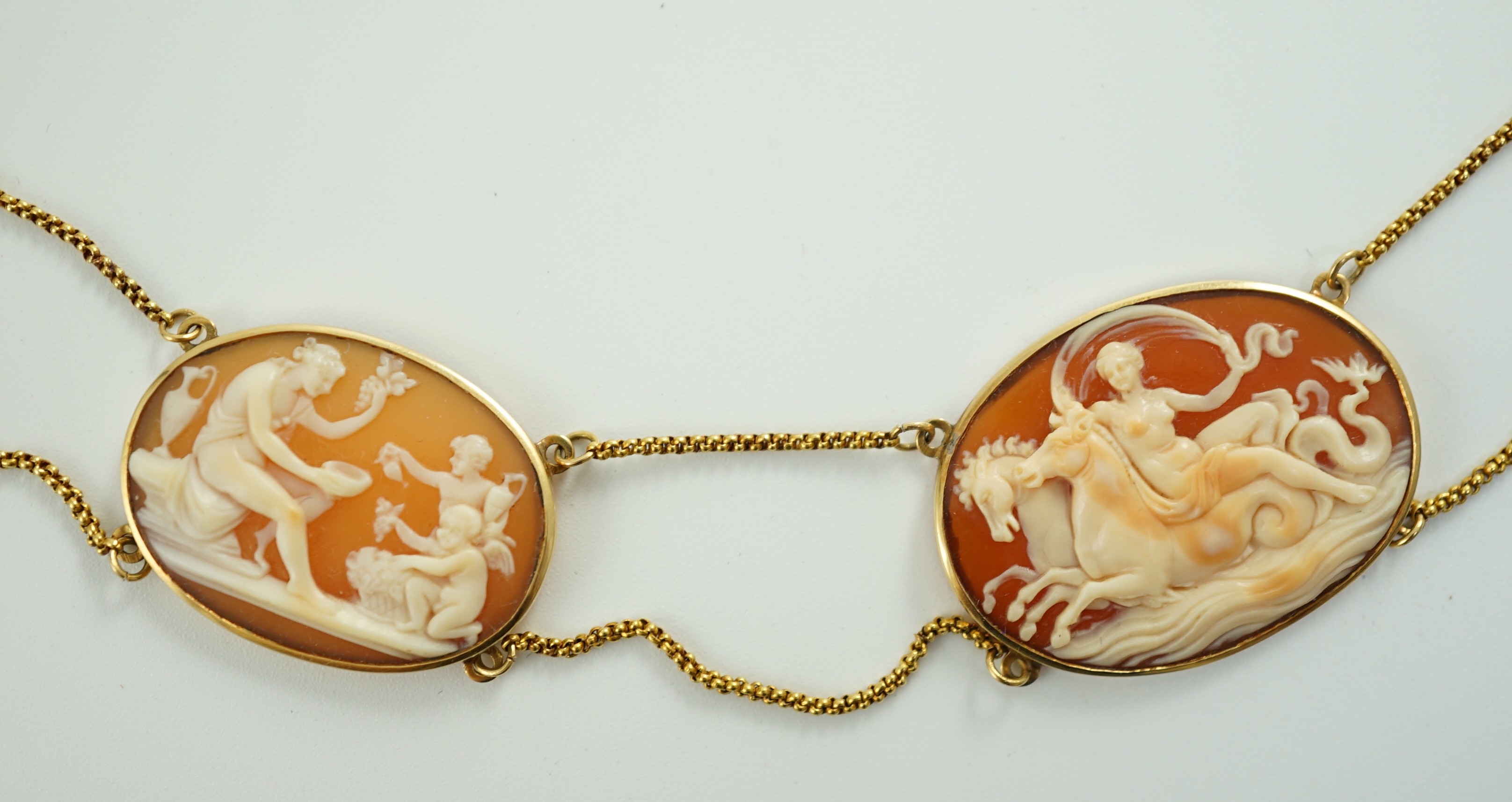 A late Victorian gold and graduated oval cameo shell necklace